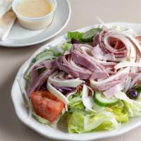Antipasto Salad · Half tray serves 6-10 house dressing served on side.