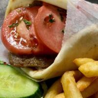 Gyro Plate · Gyro on pita with tzatziki, onions and tomatoes. Served with fries and salad.