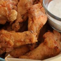 Eddies Party Wings · Crispy-fried eddies flats and drums covered in your choice of sauce. It comes with blue chee...