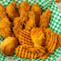 Chicken & Tenders Family Meal · Twelve pieces chicken mix, six pieces cajun tenders, six biscuits, and family fries.