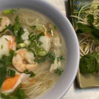 Seafood Combo · Rice noodles served in pho broth with shrimp, imitation crab, squid, and seafood balls.