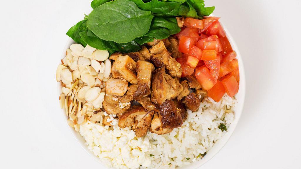 Spinach Feta Bowl · Your choice of rice and protein served with diced sweet potato, spinach, feta cheese, almonds, and a side of balsamic viniagrette.