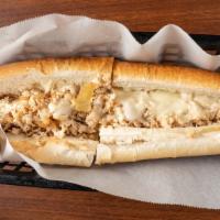 Chicken Cheesesteak · Shredded chicken steak cooked with onions green peppers lettuce and tomatoes.