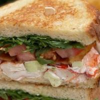 Lobster Blt · Maine Lobster, Baby Arugula, Tomatoes, Bacon and Mayo on a Toast Sourdough Bread. Served wit...