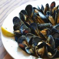 Sautéed Fresh Mussels · Served Portuguese style, red sauce, or oil & garlic.
