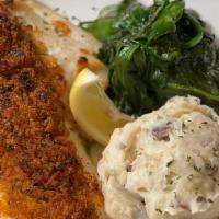 Baked Stuffed Haddock · Fresh baked haddock with cracker stuffing.. Served with your choice of two sides.