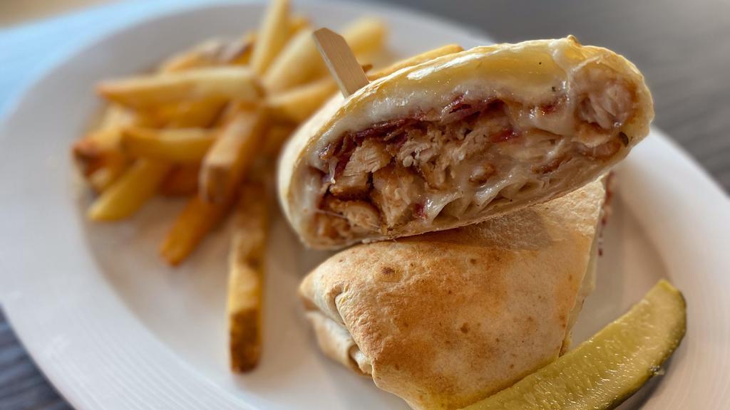 Chicken Bacon Ranch Wrap · Crispy fried chicken, bacon, ranch dressing, melted mozzarella and provolone cheese in a toasted wrap.