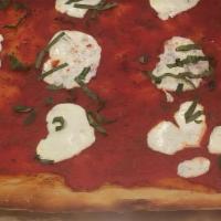 Margarita Pizza (Sicilian) · Topped with Fresh Mozzarella and Basil.