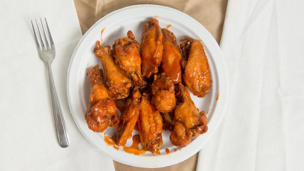 Signature Wings (10) · In your choice of one sauce or rub.