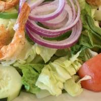 Grilled Jumbo Shrimp Salad · Over mixed green salad.