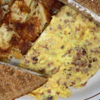 Bacon Omelette · Omelettes are made with three eggs.
