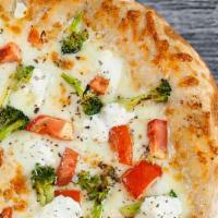 White Vegetable Pizza · Broccoli, fresh tomatoes, oregano, ricotta, fresh garlic, olive oil and mozzarella. No sauce.