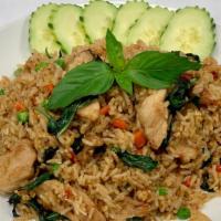 Basil Curry Fried Rice (Khao Pud Poung Ka Lee) · Basil and yellow curry stir fried with choice of meat.