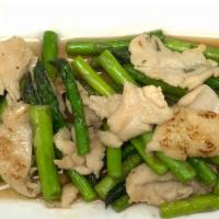 Ckn'S Stir Fried Asparagus · Gluten free. Stir-fried asparagus with oyster sauce, garlic and served with sticky rice or s...