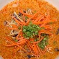 Curry Noodle Soup · Vermicelli noodles, curry paste, coconut milk, cabbage, carrot, and long green bean.