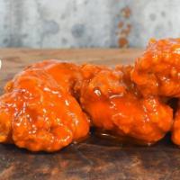 Boneless Chicken (10Ct)  · Includes your choice of wing sauce: honey bbq mild hot or sweet thai chili or chipotle bbq.