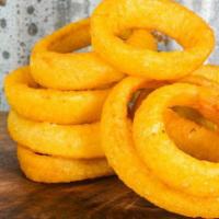 Beer Battered Onion Rings · Served With Horseradish Sauce.