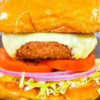 Vegan Burger · Plant based, all-vegetarian patty,
melted Vegan American, lettuce, tomato, onions,
homemade ...