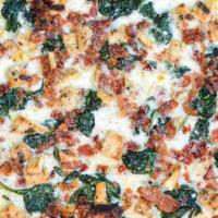 Chicken Bacon Ranch · White pizza topped with spinach, grilled chicken, chopped bacon, grated Romano and ranch dre...