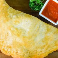 Pizza Turnover  · Mozzarella cheese and pizza sauce inside. Traditionally fried. Served with fried.