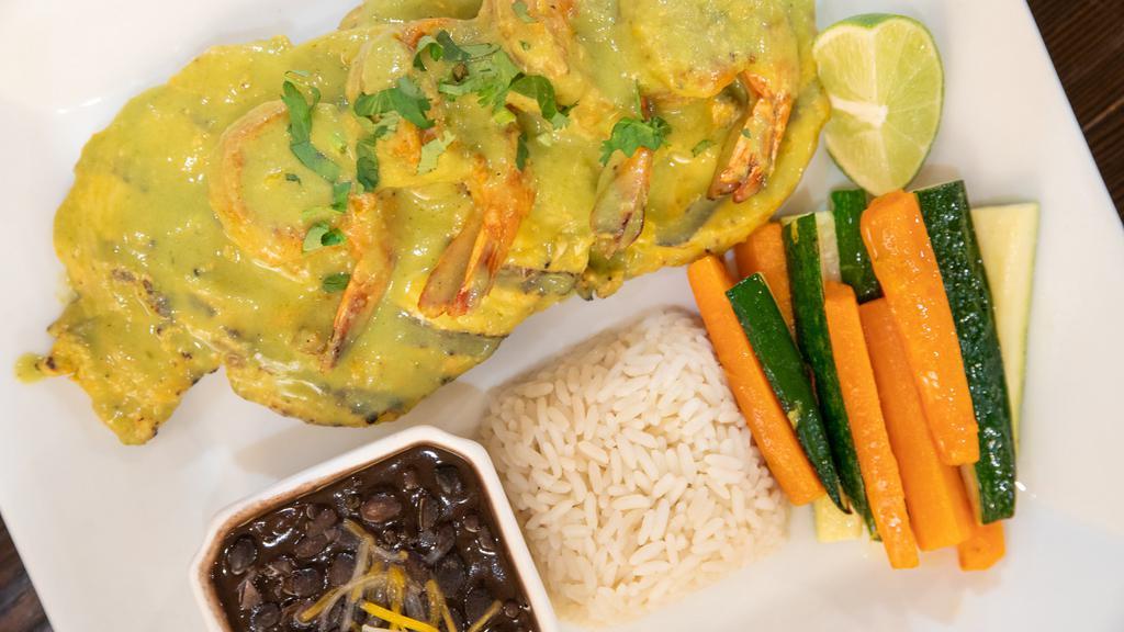 Pollo Mexicano · grilled chicken breast topped with shrimp & finished in cilantro sauce, served with white rice, black beans & a side of vegetables