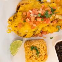 Pollo Veracruz · grilled chicken breast topped with pico de gallo and melted cheese, served with rice and bla...