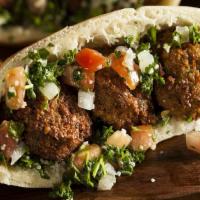 Falafel · Vegan. Fried balls of ground chickpeas and spices.