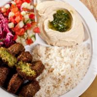 Falafel Platter · Fried balls of ground chickpeas and spices. Served with pita, your choice of french fries, r...