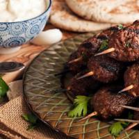 Beef Kabob Platter · Grilled skewers of lightly spiced ground beef. Served with pita, your choice of french fries...