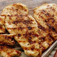 Chicken Breast Platter · Grilled filet of tender seasoned chicken breast. Served with pita, your choice of french fri...