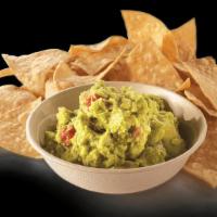  8Oz Guacamole And Chips  · Served with cilantro, jalapeños, onions, tomatoes, and lime juice.