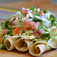 Flautas (Loaded)  · (3)  Crispy Chicken  Tacos Topped  With  Lettuce, Beans, Pico de gallo, cheese, tomatillos s...