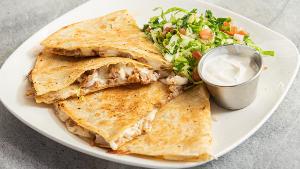 Quesadillas · Flour tortilla, cheese, sour crème, pico de gallo. Choice of grilled chicken, carnitas, pastor, chorizo, chicken tinga, vegetable.