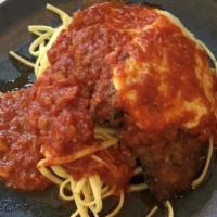 Chicken Parmesan · Lightly pounded breast of chicken or veal, breaded and served with fresh Pomodoro sauce and ...
