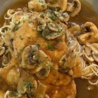 Chicken Marsala · Lightly pounded breast of chicken, floured, sautéed with shallots and mushrooms, finished in...