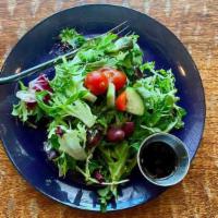 House Salad · Crisp, fresh Romaine, mesclun greens, grape tomatoes, cucumbers, red onion, and julienne car...