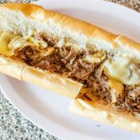 Philly Cheesesteak Hoagie · Lettuce, tomatoes, and onions.