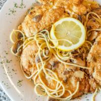 Chicken Francese · Sautéed with mushrooms in a white lemon sauce.