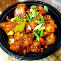 Gobi Manchurian · Cauliflower with green peppers & onions sautéed in chef's special manchurian sauce.
