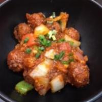 Veg Manchurian · Assorted vegetables sautéed in chef's special manchurian sauce.