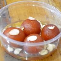 Gulab Jamun · Milk based balls dipped in rose & honey syrup.