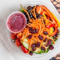 Garden Salad · Fresh salad greens, sweet peppers, cucumbers, red cabbage, pear tomatoes, black olives and c...