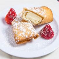 Wango Tango · Deep-fried plain cheesecake frozen first then wrapped in filo dough. Then fried and sprinkle...