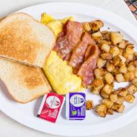 Breakfast Platter · 3 eggs any style, choice of toast, jelly, meat and home fries.