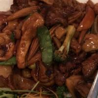 Happy Family Specialty · Sliced chicken, beef, shrimp and scallops with broccoli, pea pods, carrots and mushrooms in ...