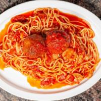 Sunday Dinner · Spaghetti, sliced sausage and one meatball.