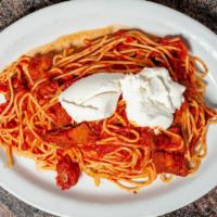 Spaghetti Carbonara · Bacon, egg, parmesan, cream.