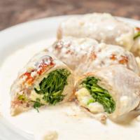 Tortellini Alla Michael · Shrimp, walnuts, spinach, gorgonzola cream sauce. * 
 
*New