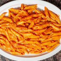 Tagliatelle Fellini · Shrimp, scallops, zucchini, chopped tomato, fresh mozzarella, light garlic marinara.