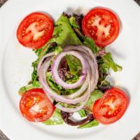 Insalata Mista · Spring mix, fresh sliced tomatoes, red onions, house dressing.